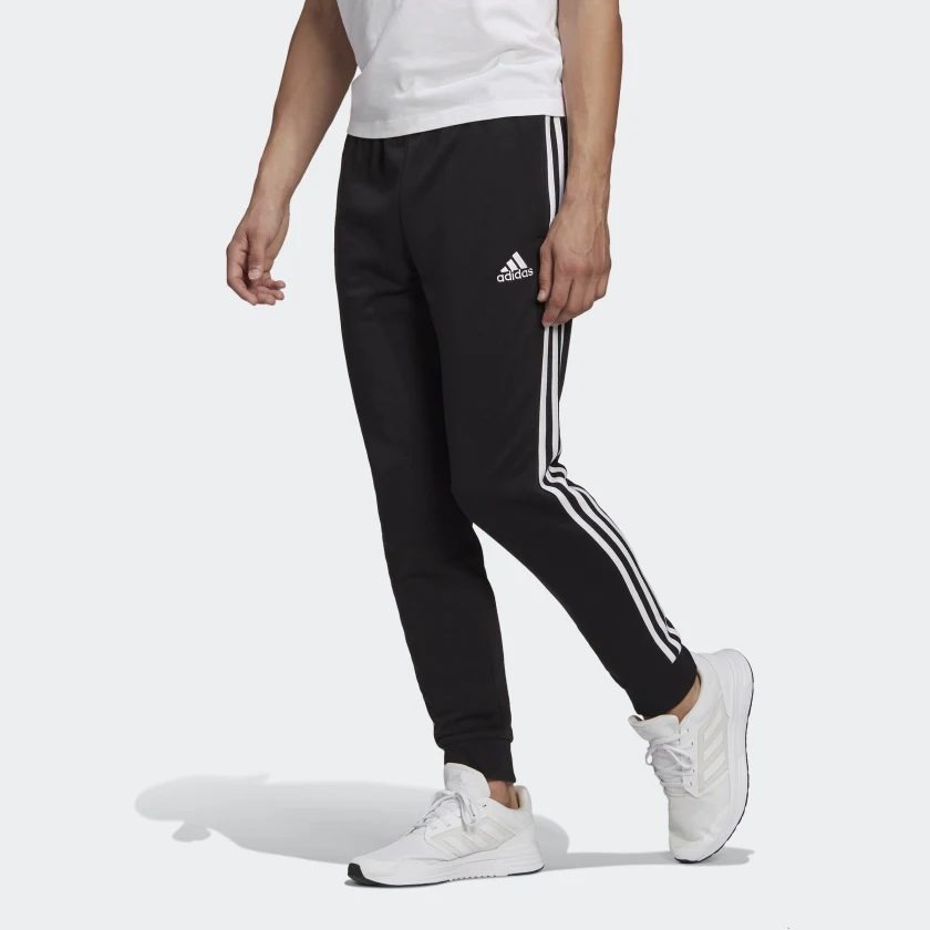 ADIDAS SPORTSWEAR PANTALONI ESSENTIALS FRENCH TERRY TAPERED CUFF 3-STRIPES